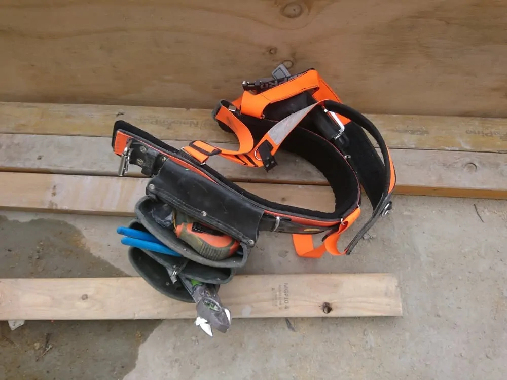Tool belt with sholder straps on building site Tool belt with sholder straps on building site