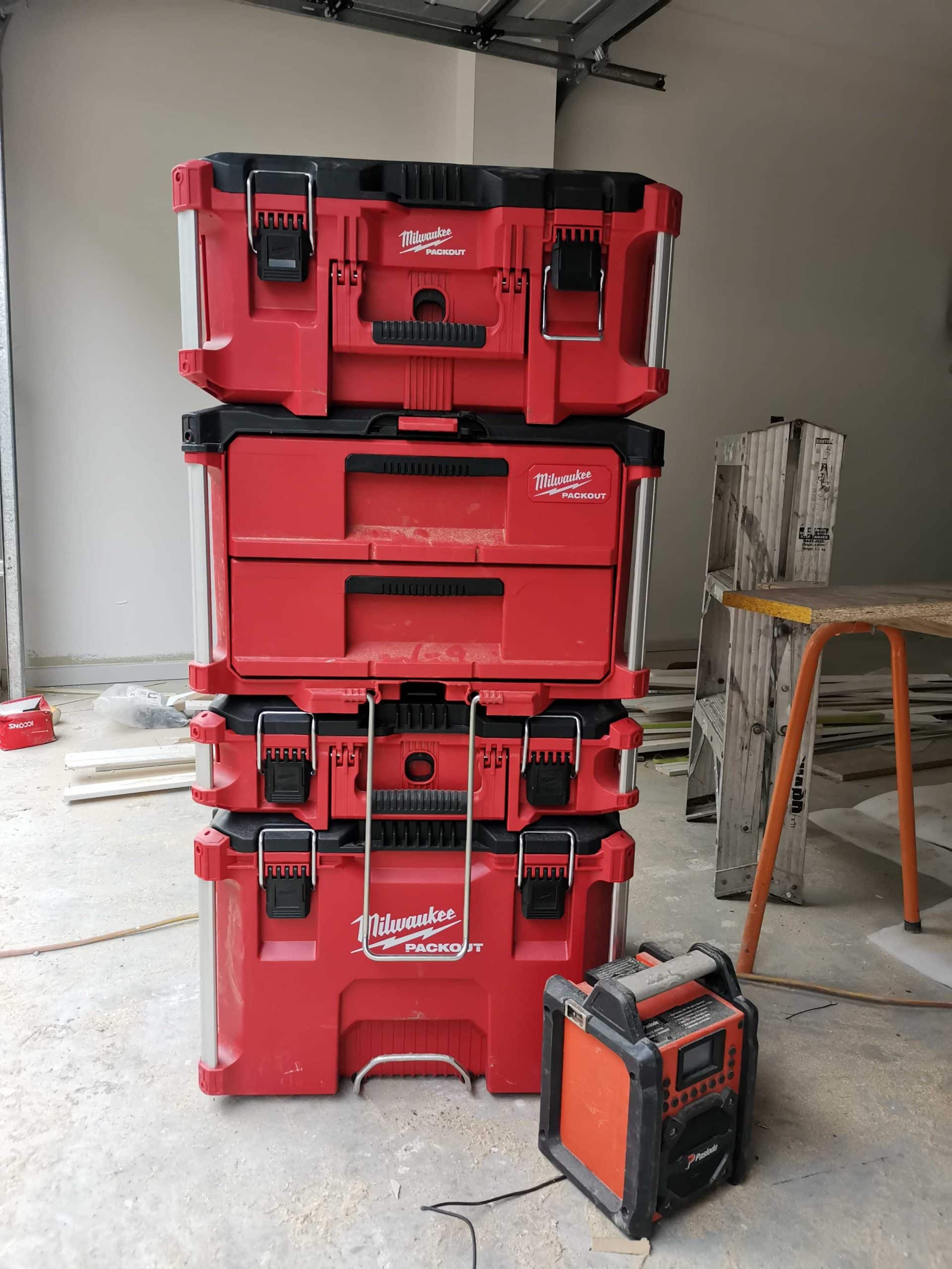 Milwaukee rolling tool bag with paslode jobsite radio