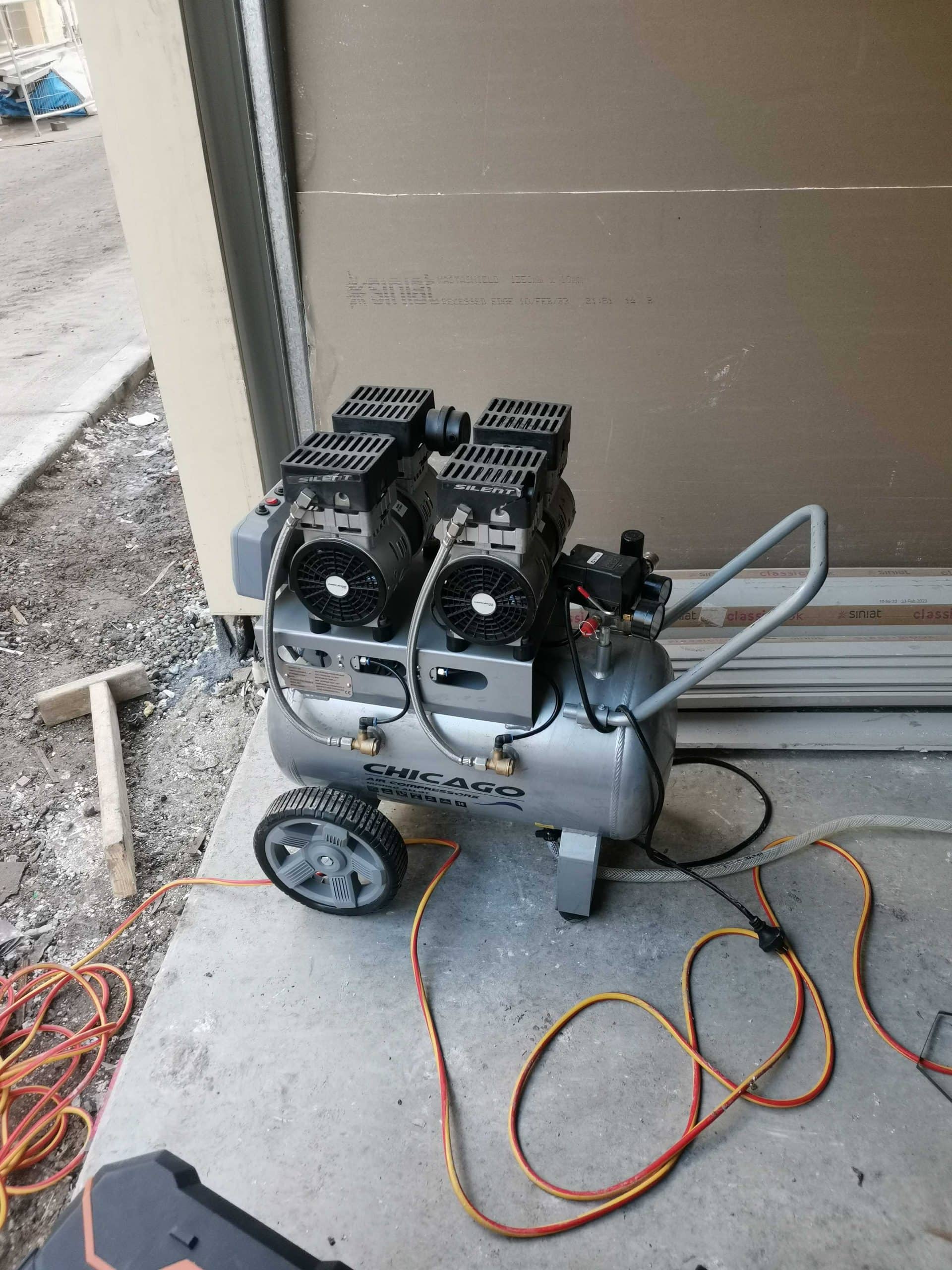 Using Chicago air compressor on site