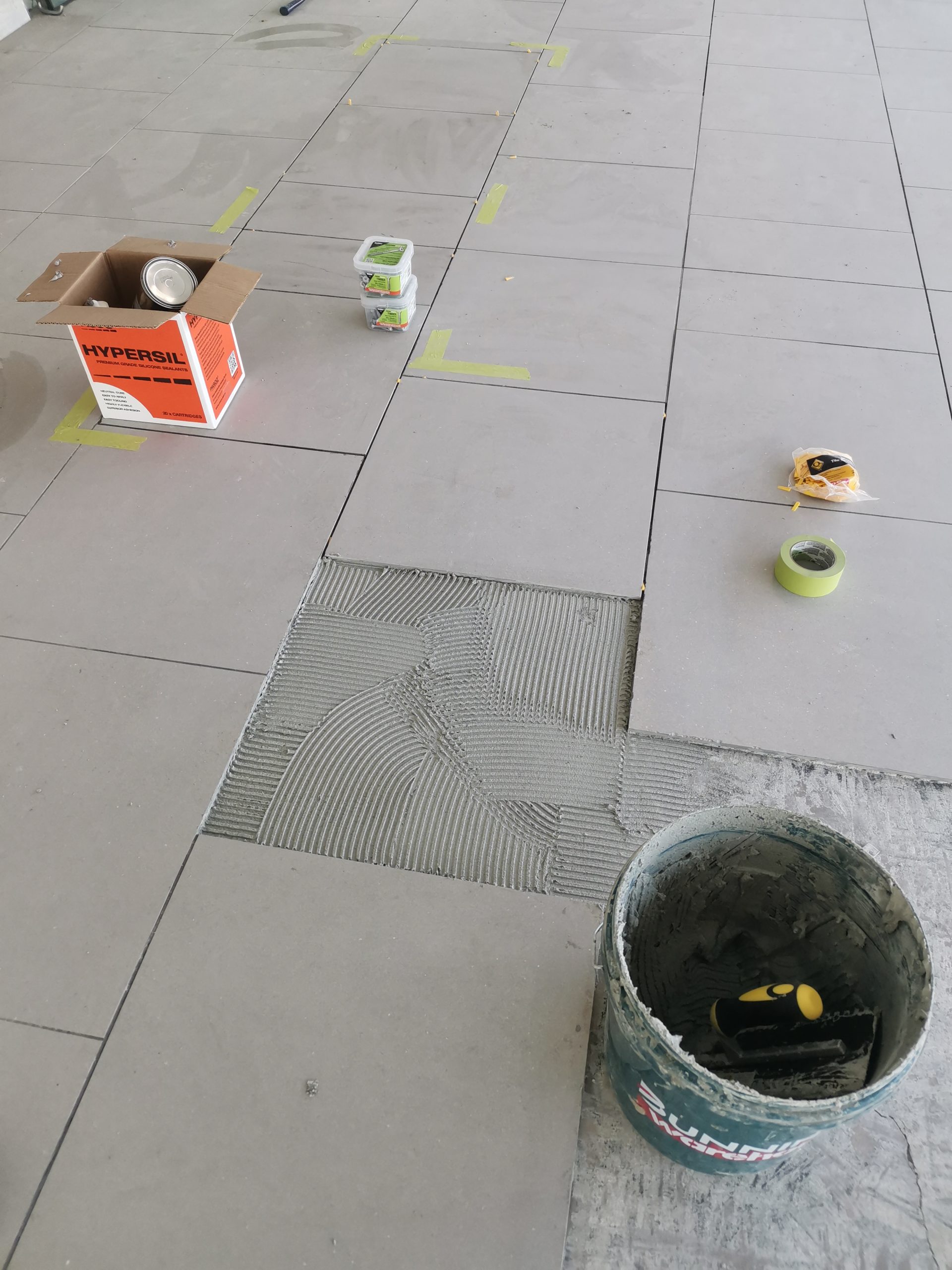 Laying tiles on the floor