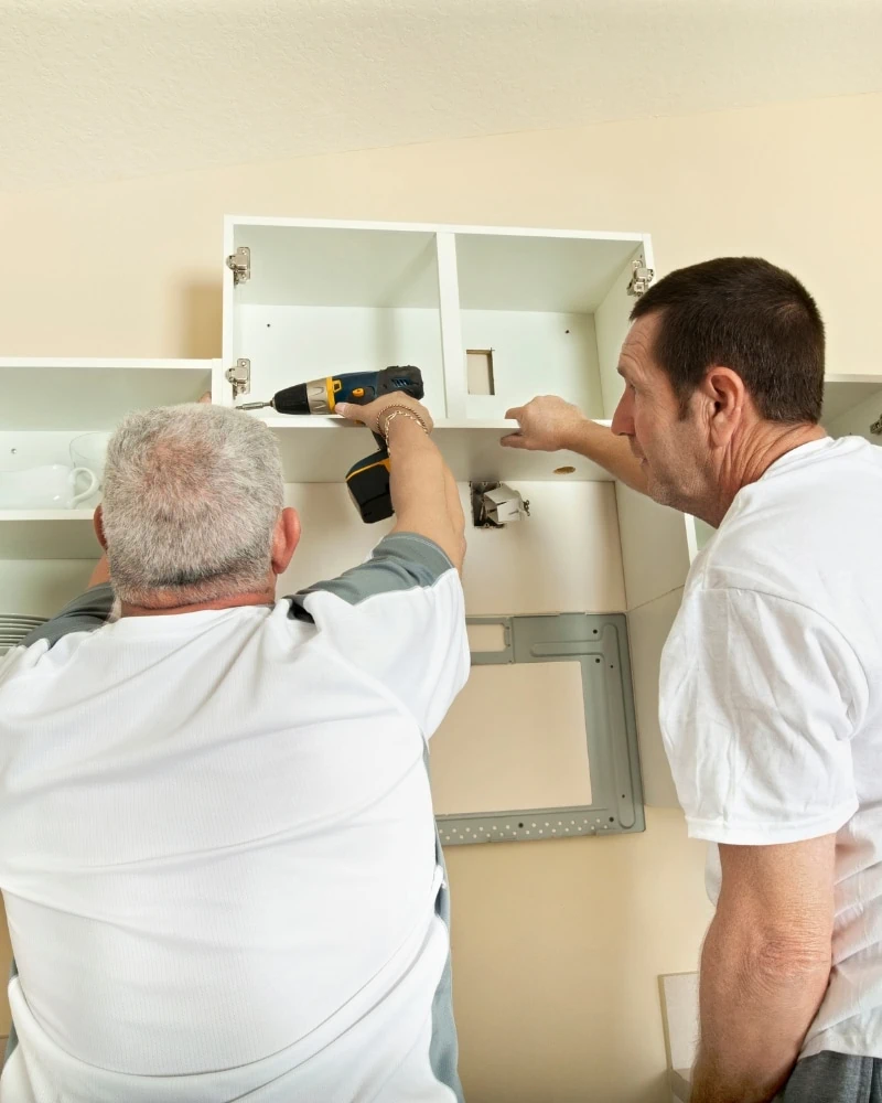 Drilling cabinet into the wall