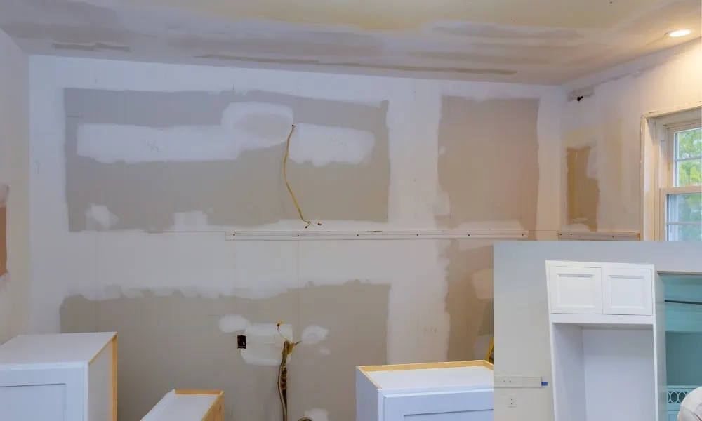 Support installed on bare wall before installing the cabinet with wall markings